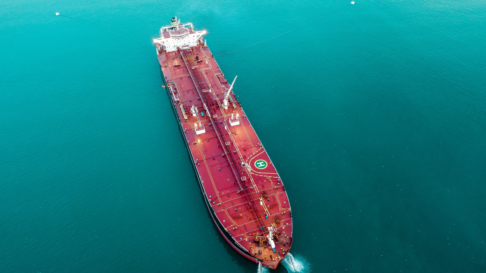 Red tanker at sea.